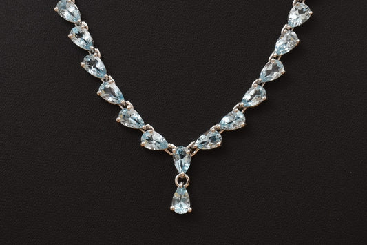 Blue Topaz Neckpiece with Rhodium coating by Lasya